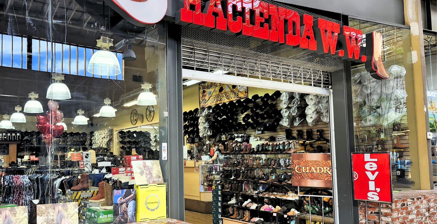 Storefront with 'Baciami' and 'Levi's' branding, displaying various products.